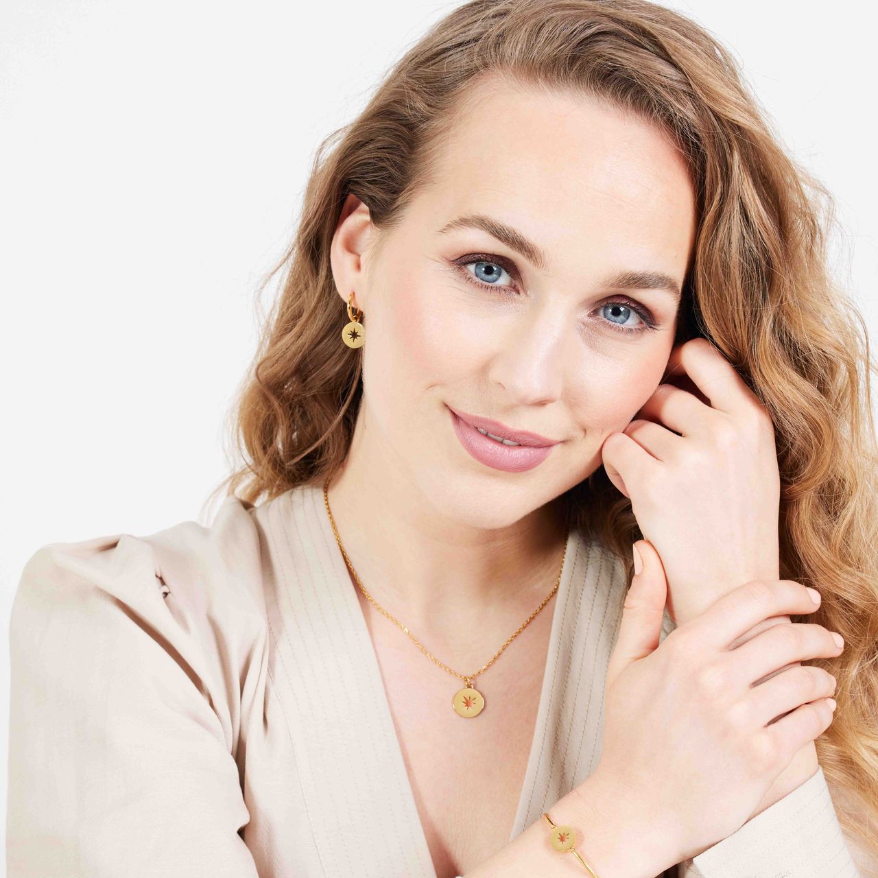 Stalen goldplated oorbellen met  Poolster