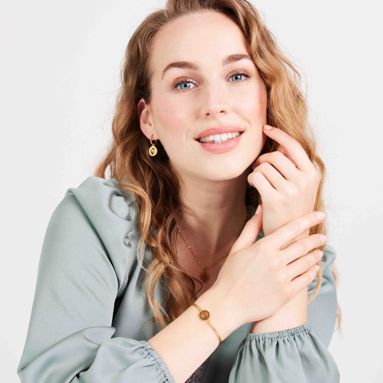 Stainless steel goldplated oorringen sterrenbeeld Maagd voor dames