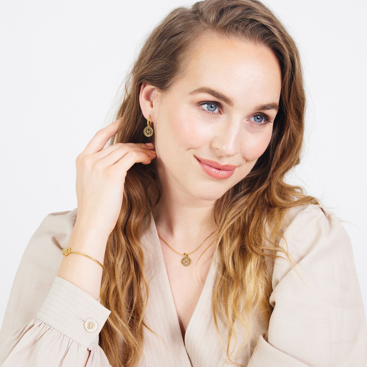 Stalen goldplated oorbellen met sterrenbeeld vissen