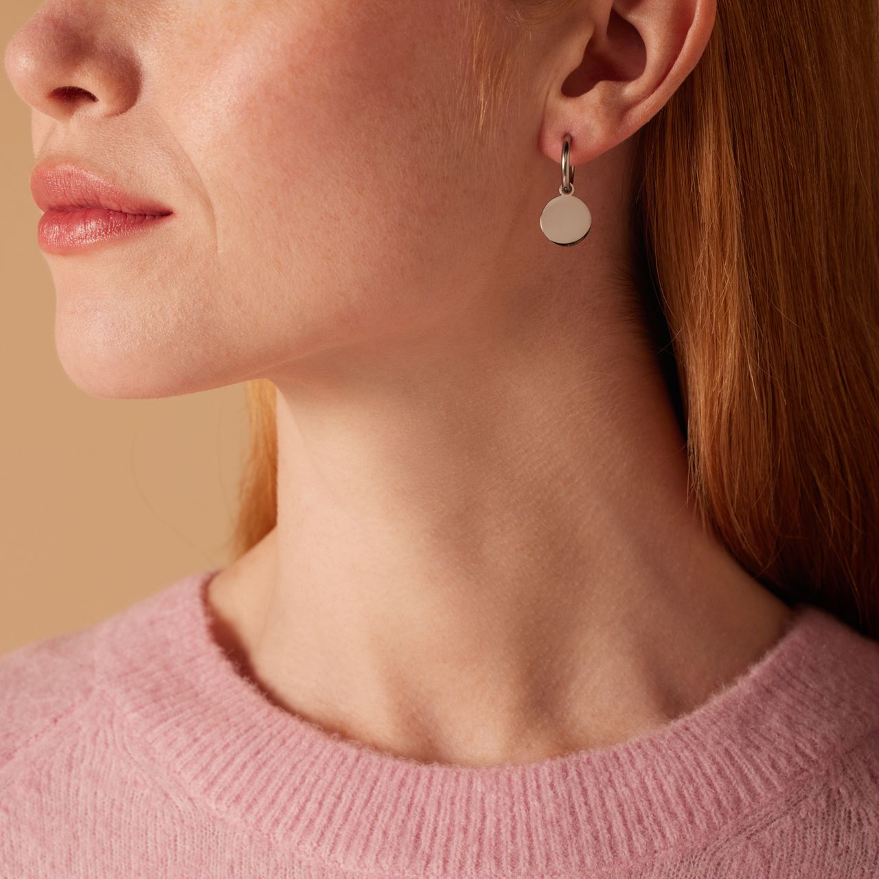 Stainless steel oorbellen met munt