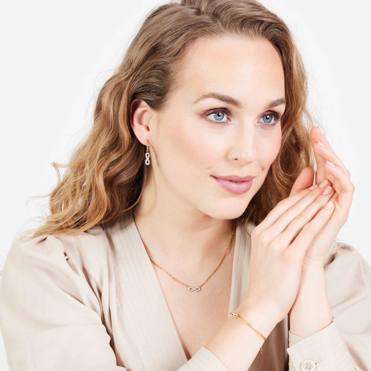 LivLiv stalen goldplated oorringen met infinity voor dames
