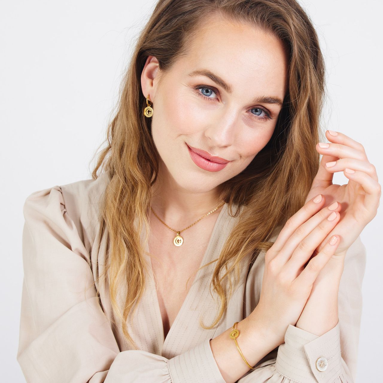 Stainless steel goldplated ketting met letterhanger G voor dames