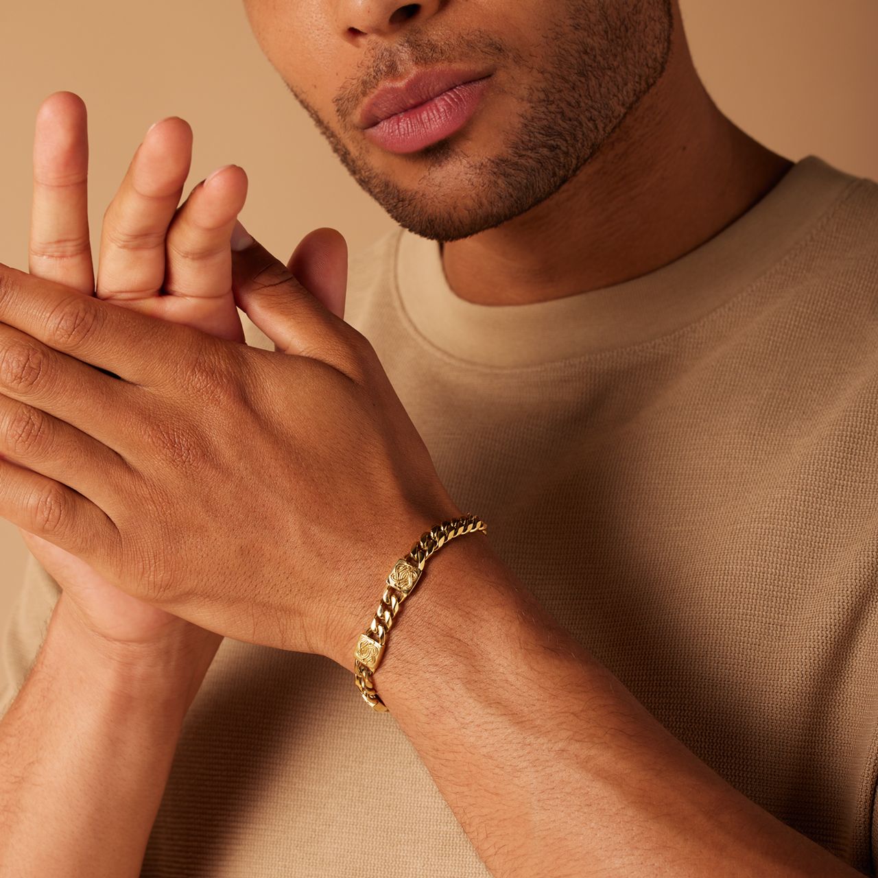 Stainless steel goldplated herenschakelarmband surinaamse mattenklopper