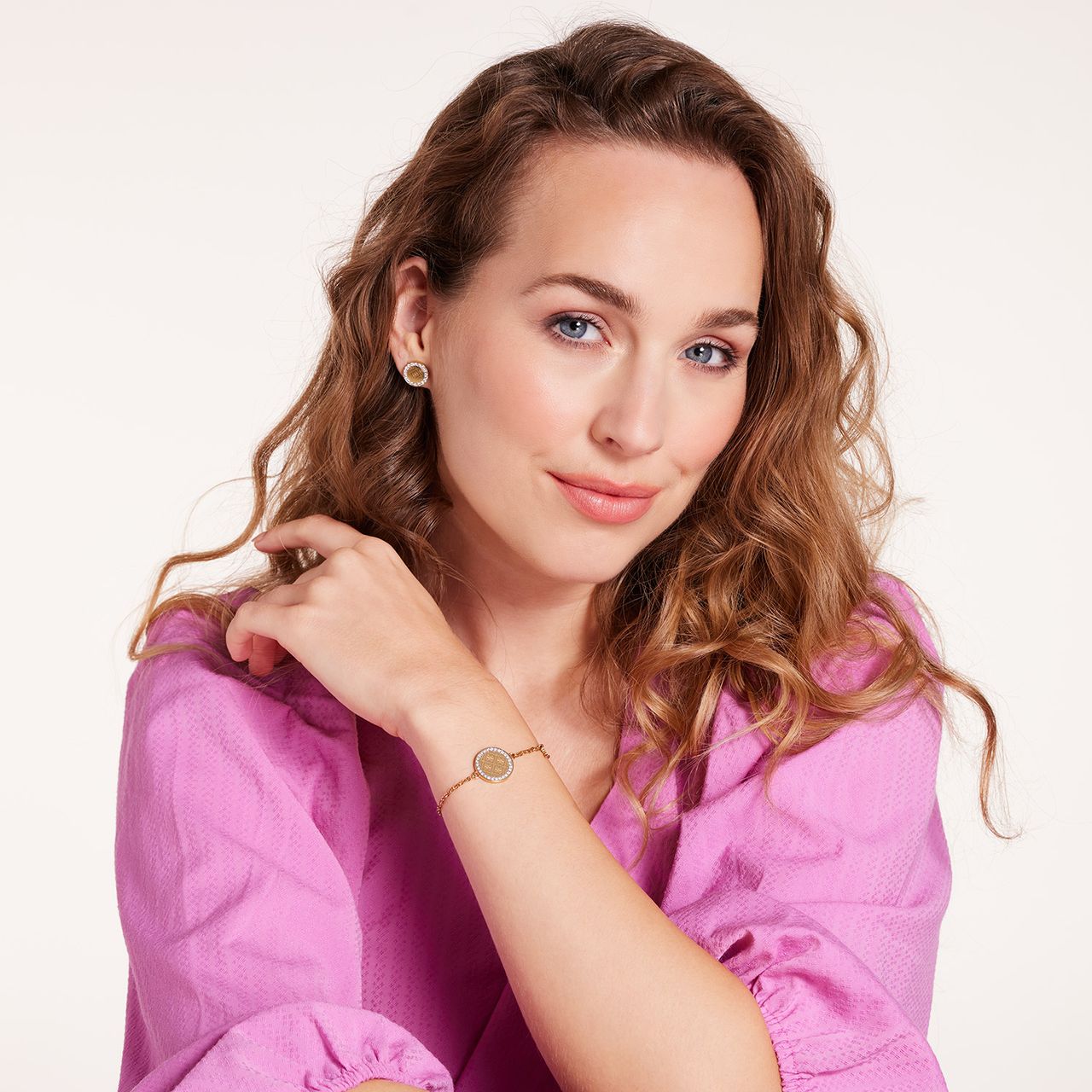 Guess stalen goldplated oorknoppen met kristal voor dames