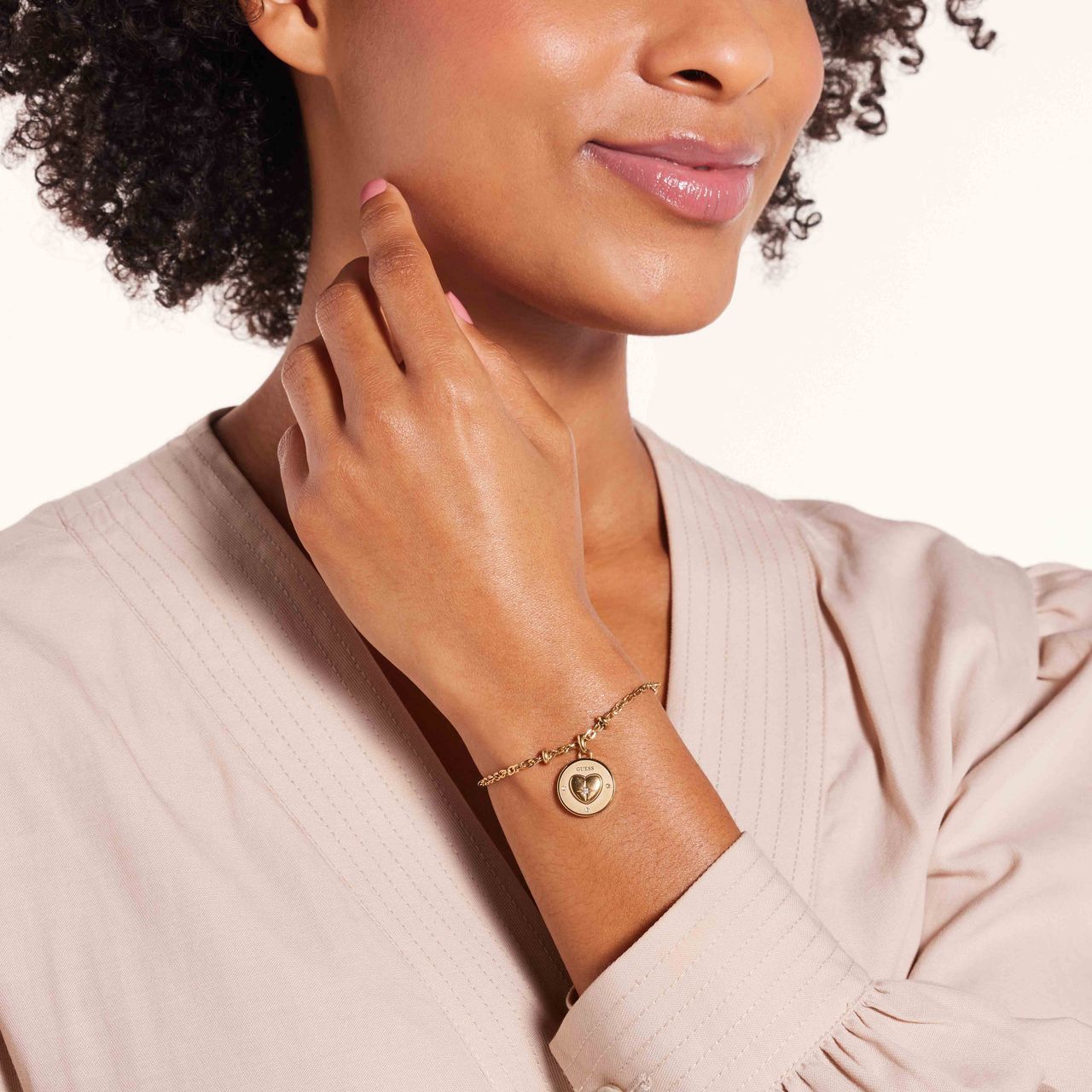 Guess stalen goldplated bedelarmband met kristal voor dames