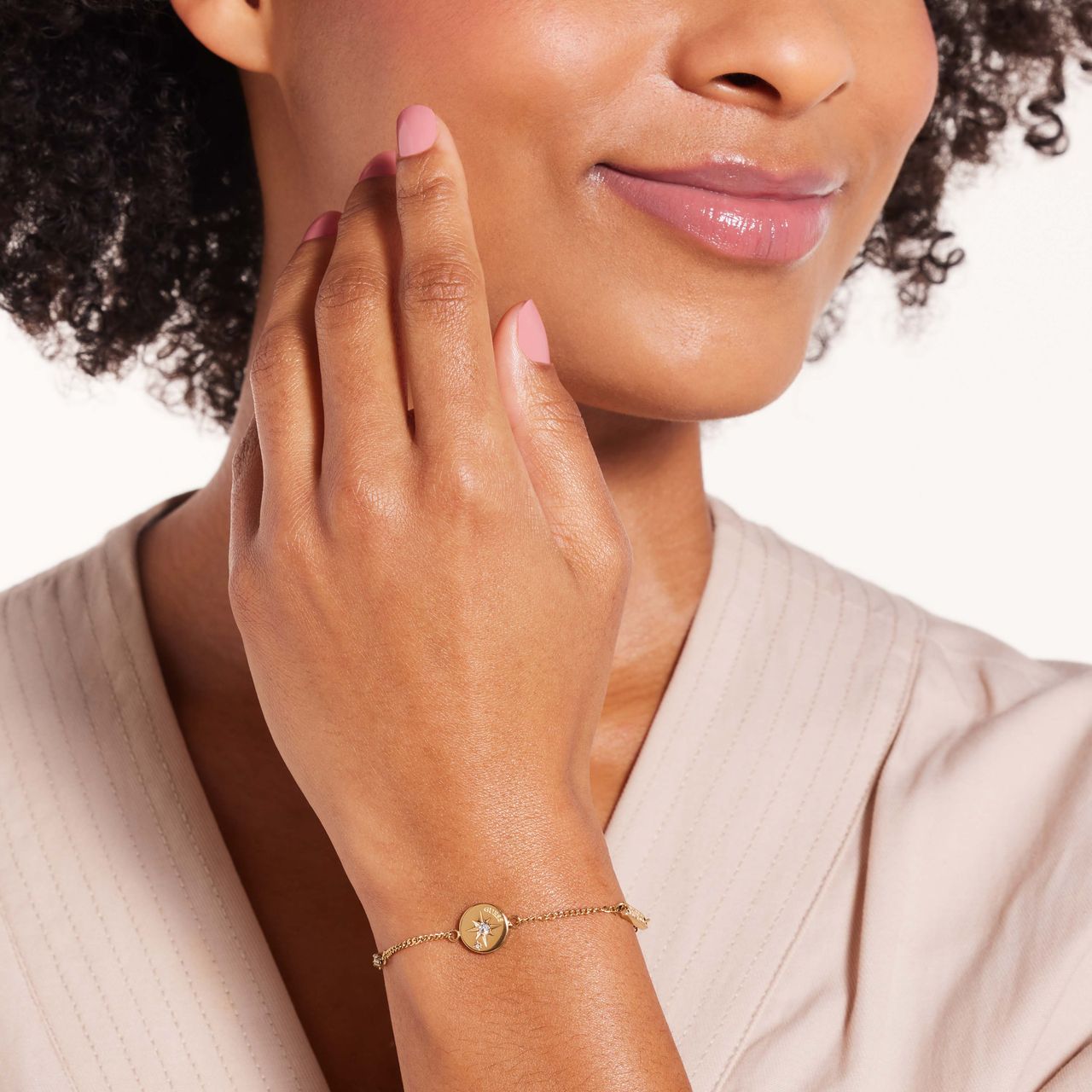 Guess stainless steel goldplated schakelarmband met kristal voor dames