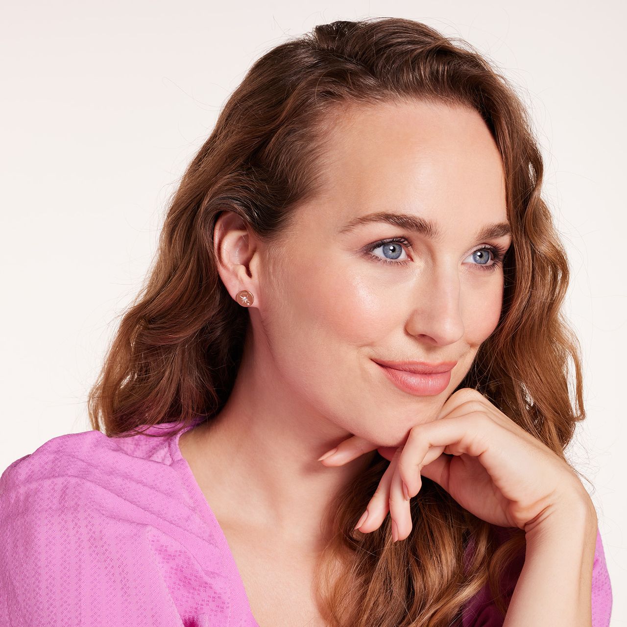 Guess stalen roséplated oorknoppen met kristal voor dames