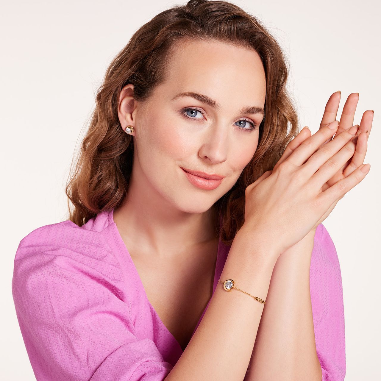 Guess stainless steel goldplated oorknoppen met kristal voor dames