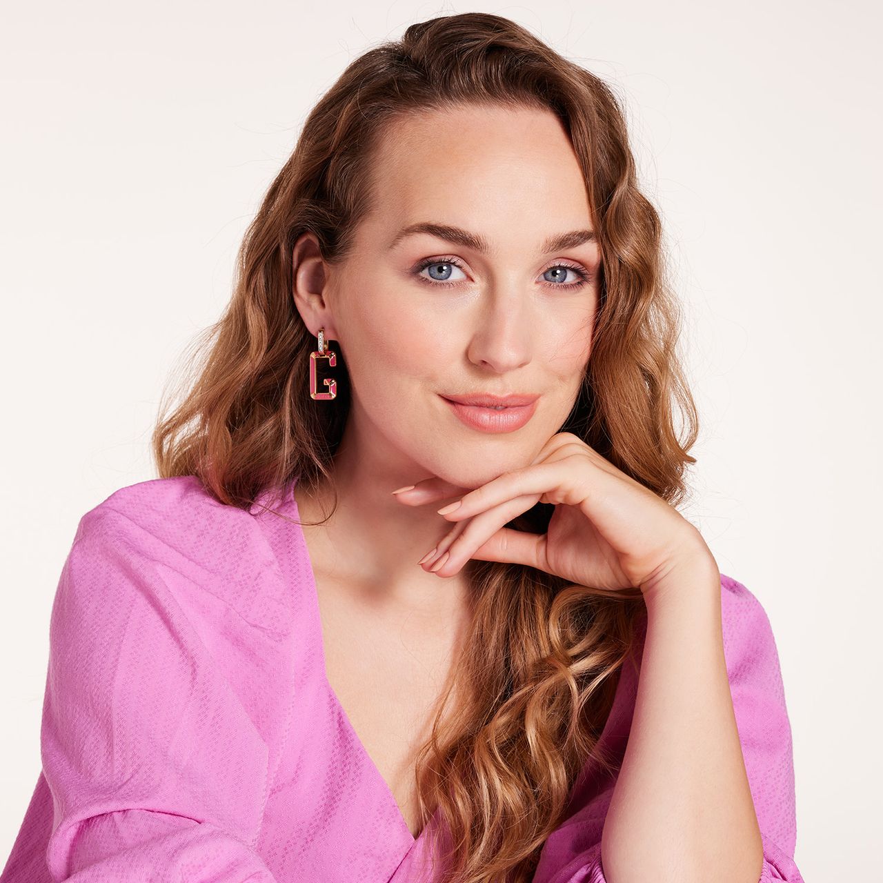 Guess roze/goud stalen oorhangers G-SHADES