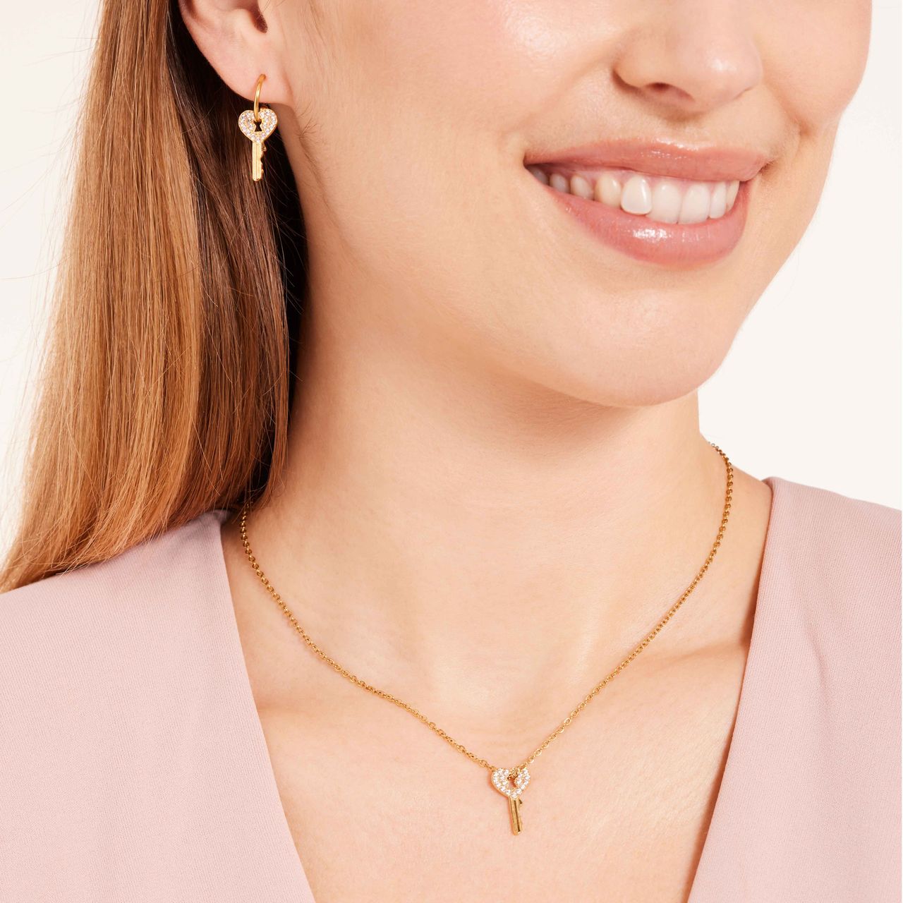 Stalen goldplated ketting met hanger sleutel zirkonia