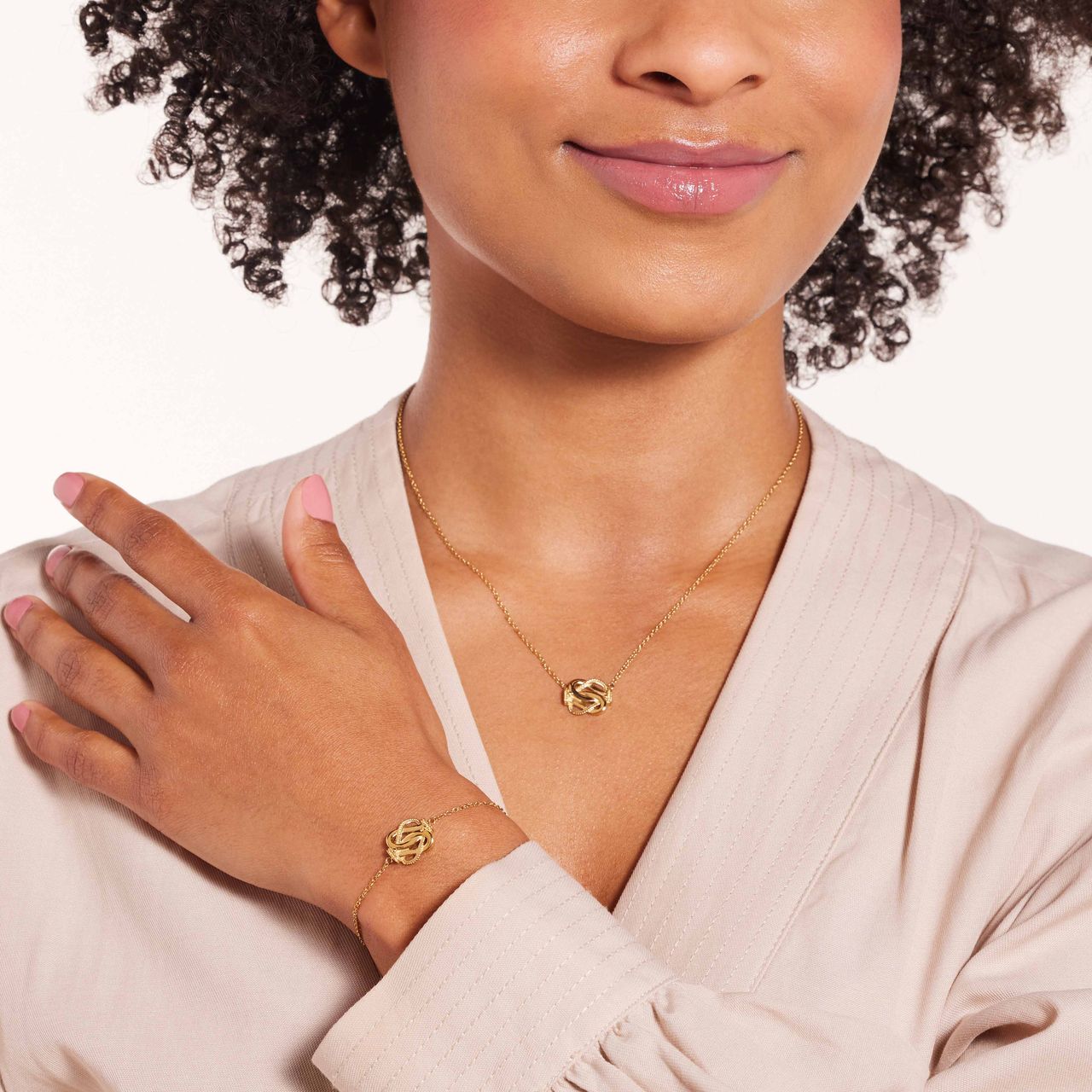 Stainless steel goldplated fantasiearmband met hangersurinaamse mattenklopper  voor dames en heren