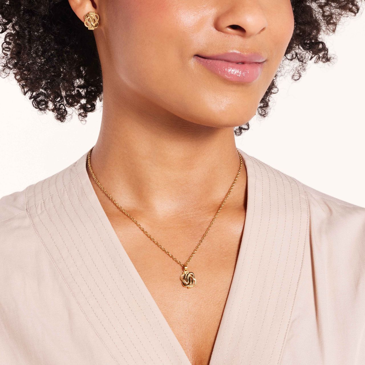 Stalen goldplated oorknoppen surinaamse mattenklopper voor dames