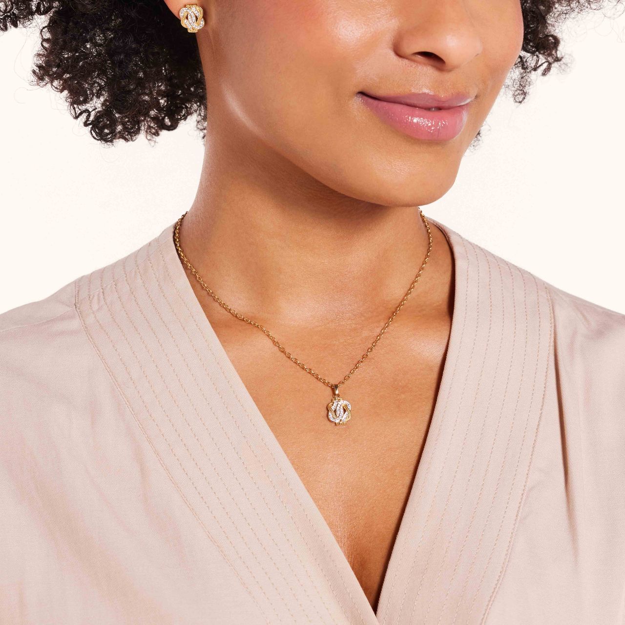 Stalen goldplated oorknoppen surinaamse mattenklopper met kristal voor dames