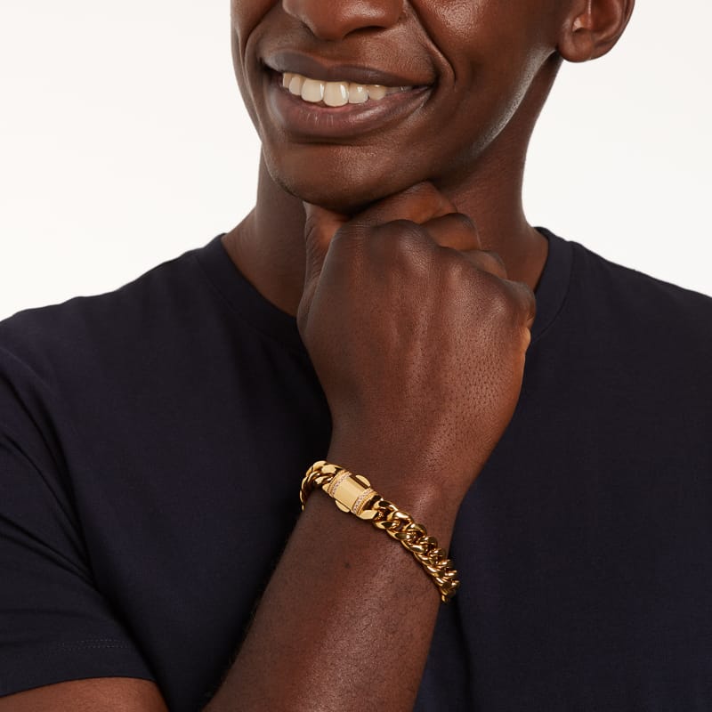 Stalen goldplated herenschakelarmband met zirkonia