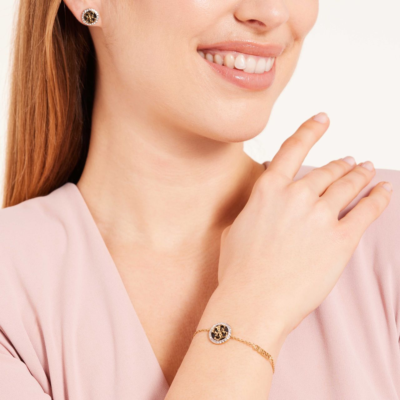 Guess goldplated stainless steel armband zwart LIFE IN 4G