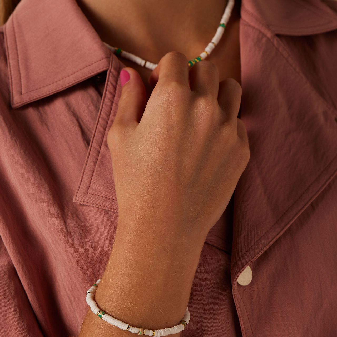 Stainless steel goldplated kralenarmband met wit en groen voor dames