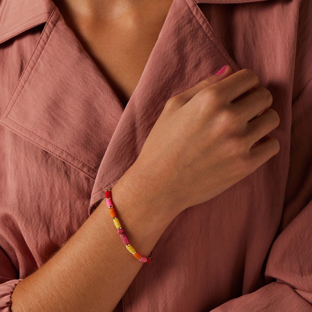 Stainless steel goldplated armband met gele kralen