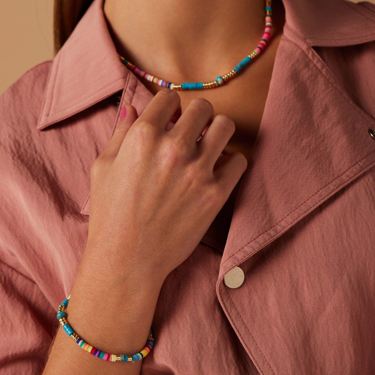 Stalen goldplated rekarmband blauwe kralen