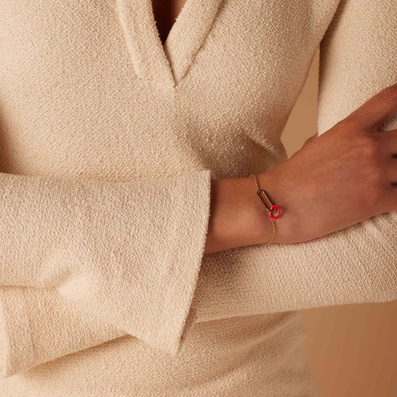Stainless steel goldplated armband met fuchsia emaille