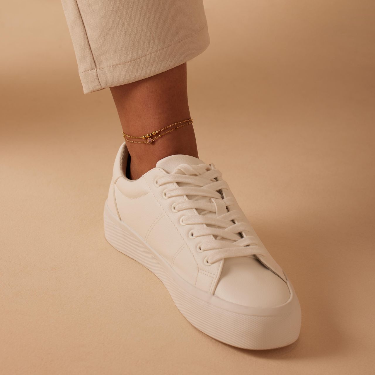 Dubbele goldplated stainless steel enkelbandje met steentje