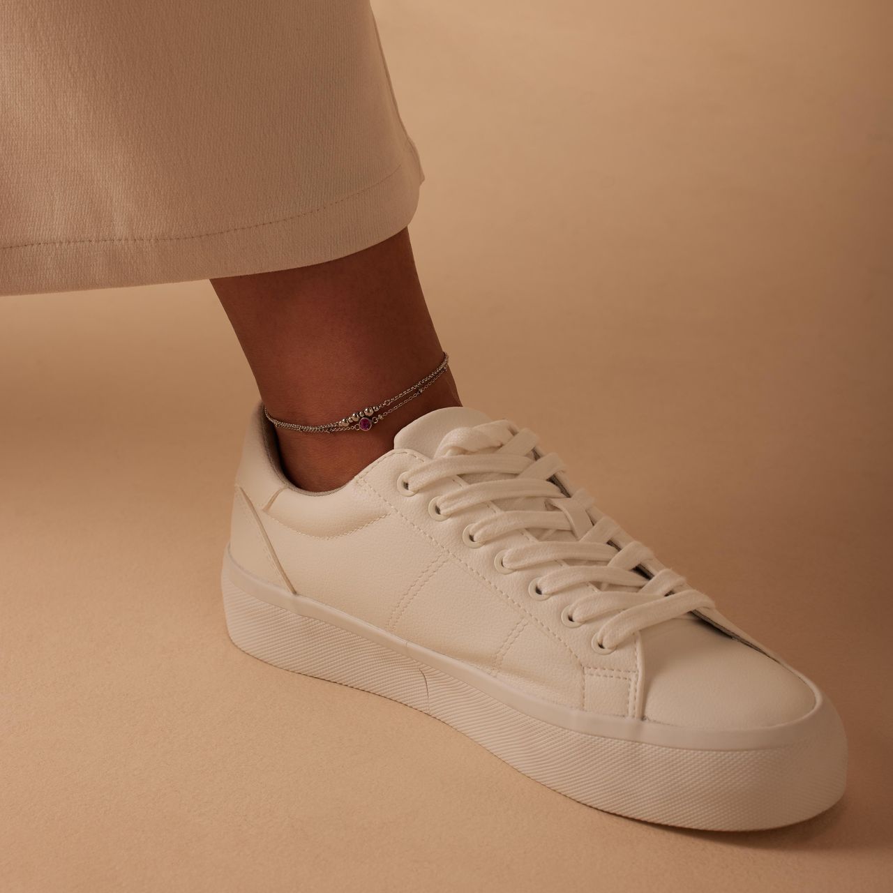 Dubbele stalen enkelbandje met fuchsia