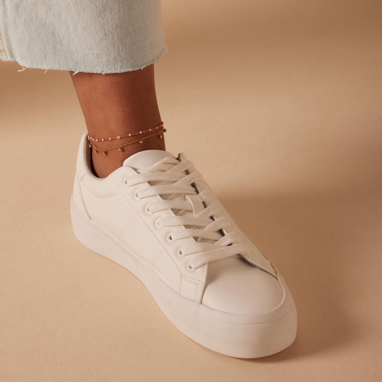 Dubbele goldplated stalen enkelband met bedeltjes