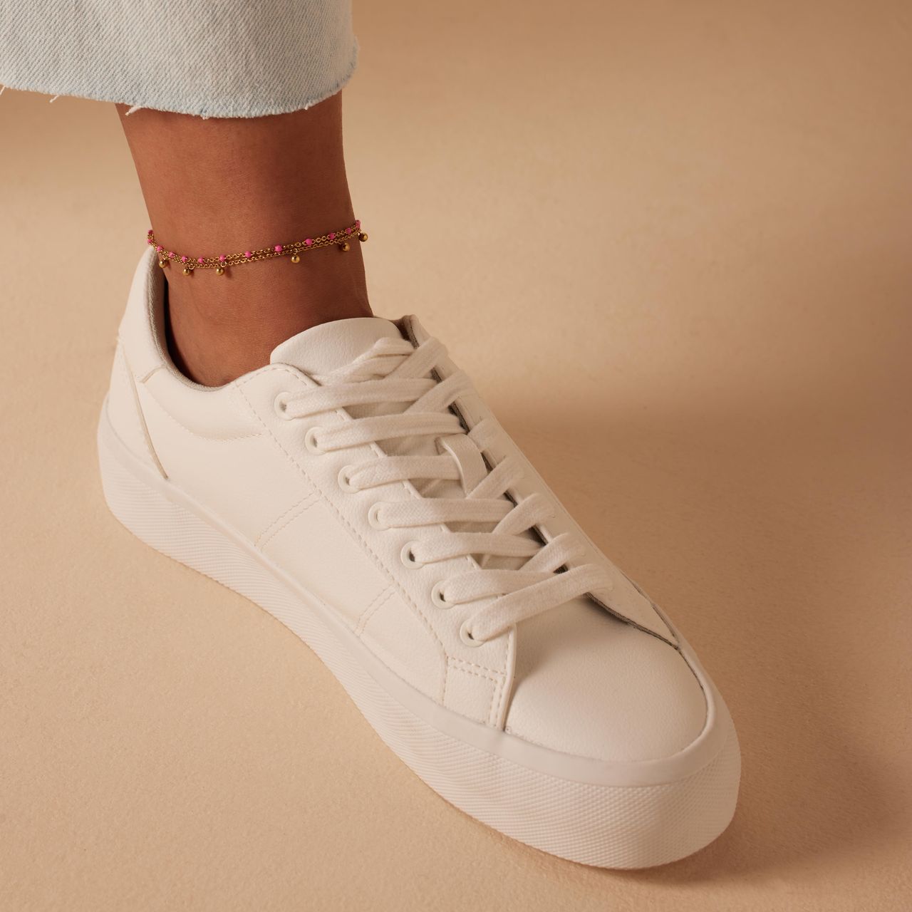 Dubbele goldplated stalen enkelband met bedeltjes