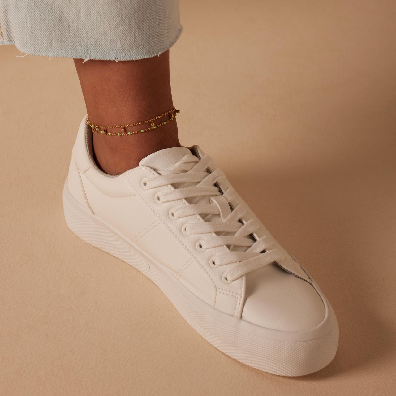 Dubbele stainless steel goldplated enkelband met bedeltjes