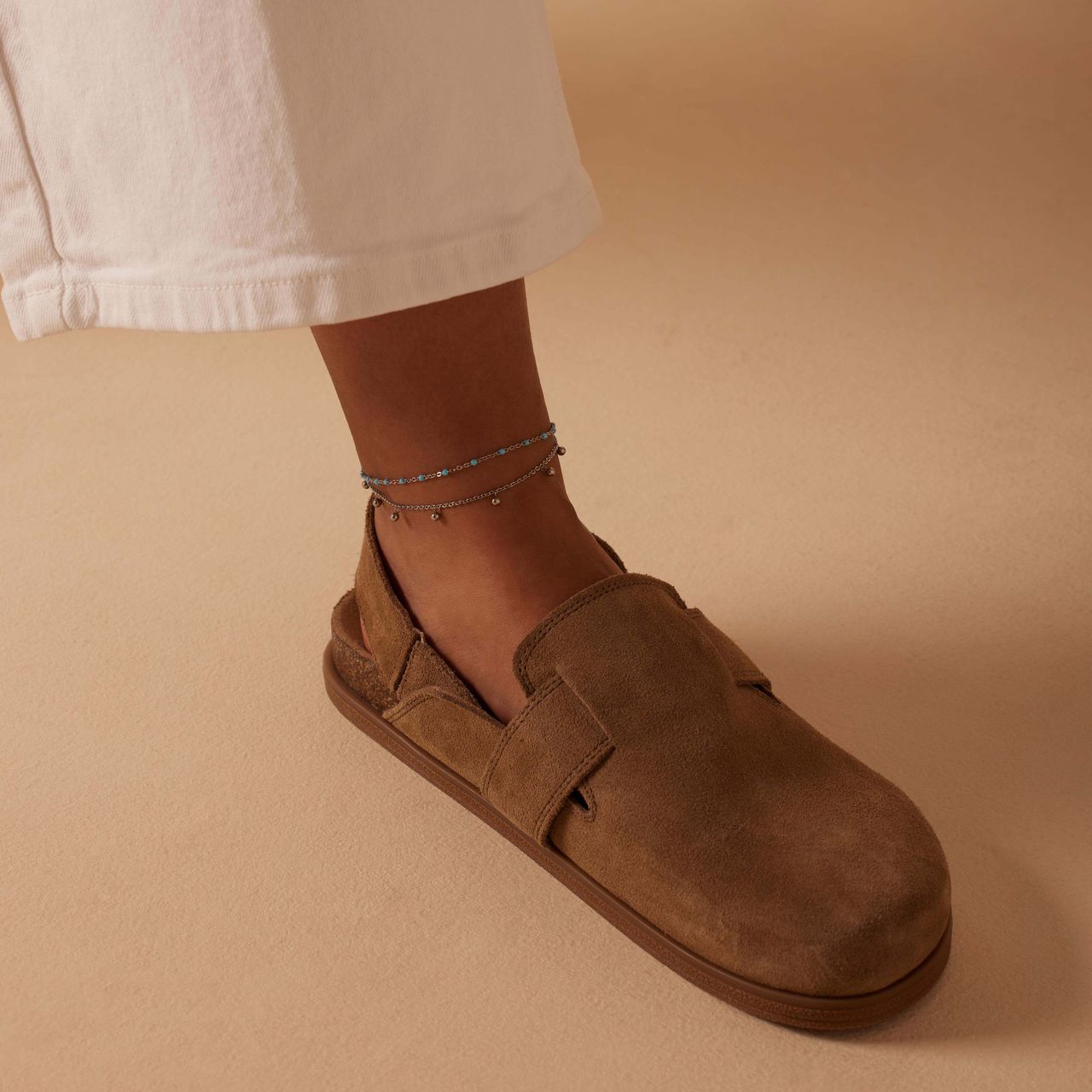 Dubbele stalen enkelband met bedeltjes