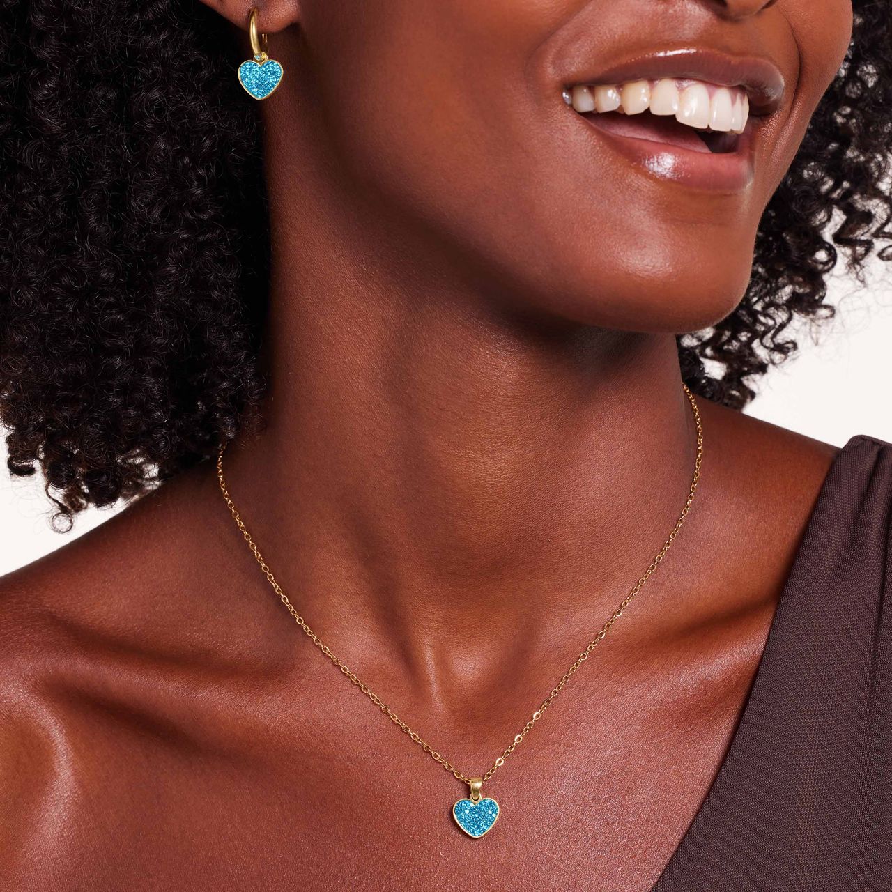 Stainless steel goldplated oorringen met hanger hart met aqua kristal aqua voor dames