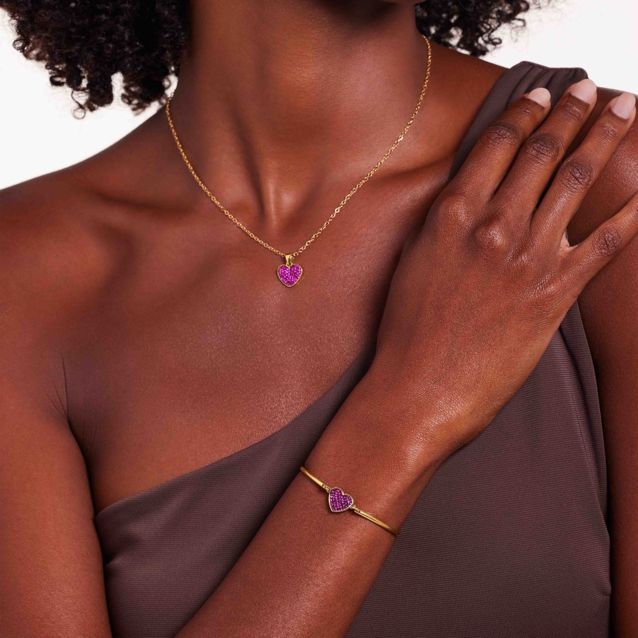 Stalen goldplated fantasiearmband met hanger hart met fuchsia kristal voor dames
