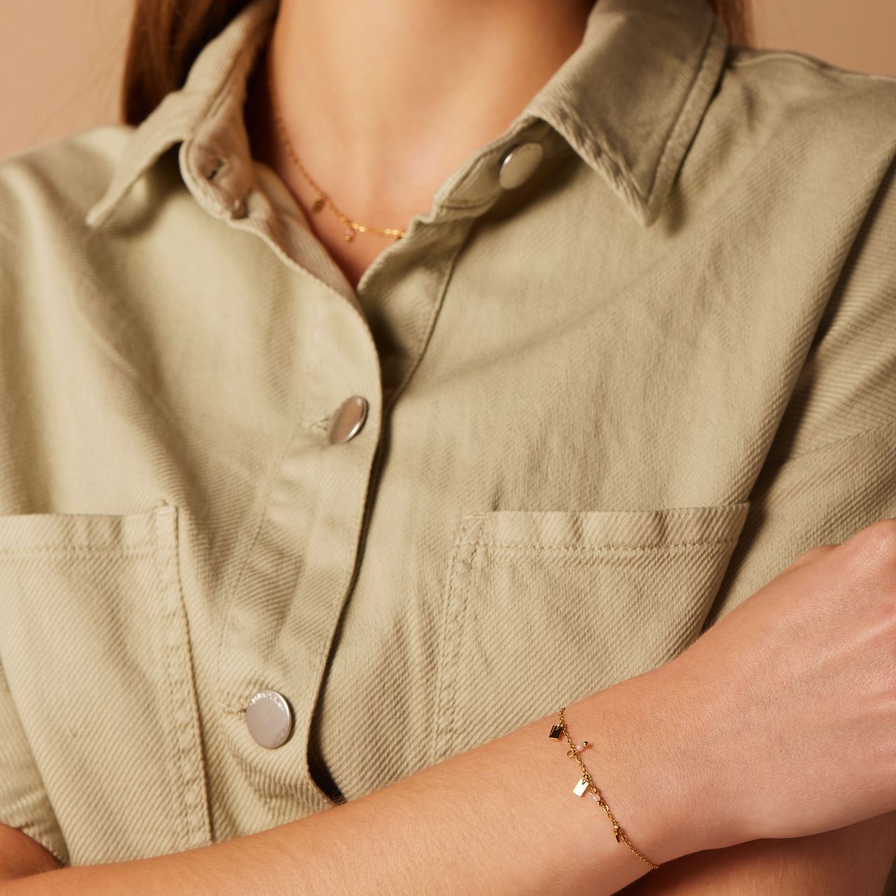 Stainless steel goldplated fantasiearmband met rozenkwarts voor dames