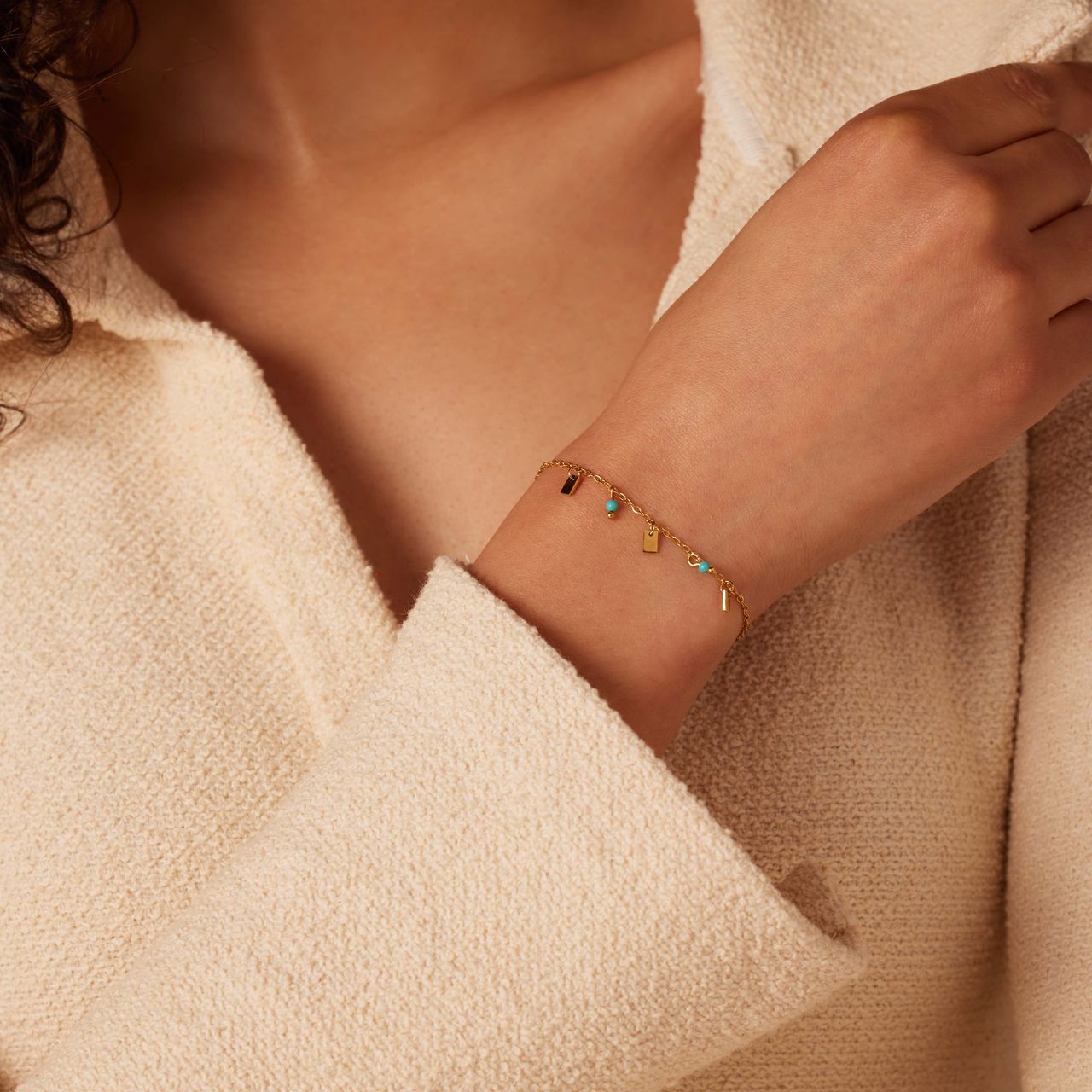 Stalen goldplated fantasiearmband met turquoise voor dames