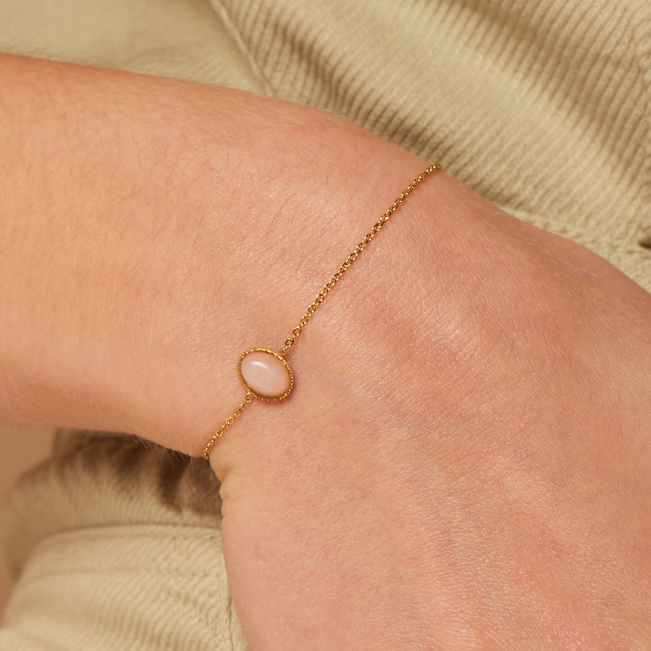 Stainless steel goldplated fantasiearmband met rozenkwarts voor dames