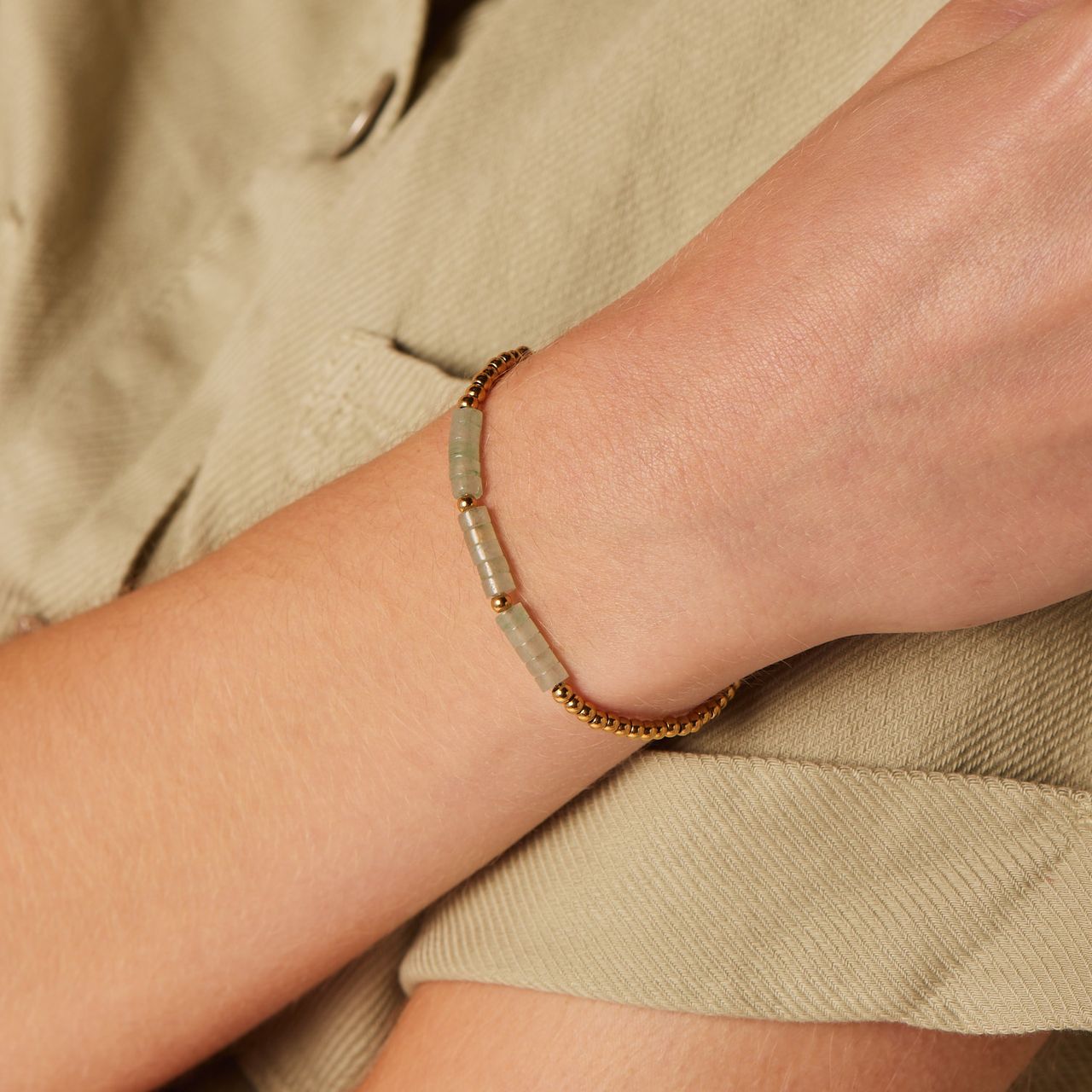 Stainless steel goldplated fantasiearmband met groene aventurijn voor dames