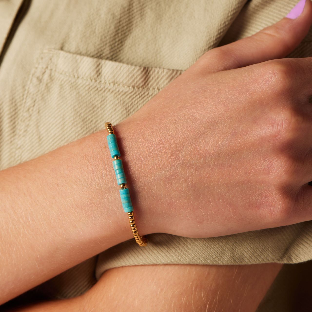 Stalen goldplated armband met turqoise