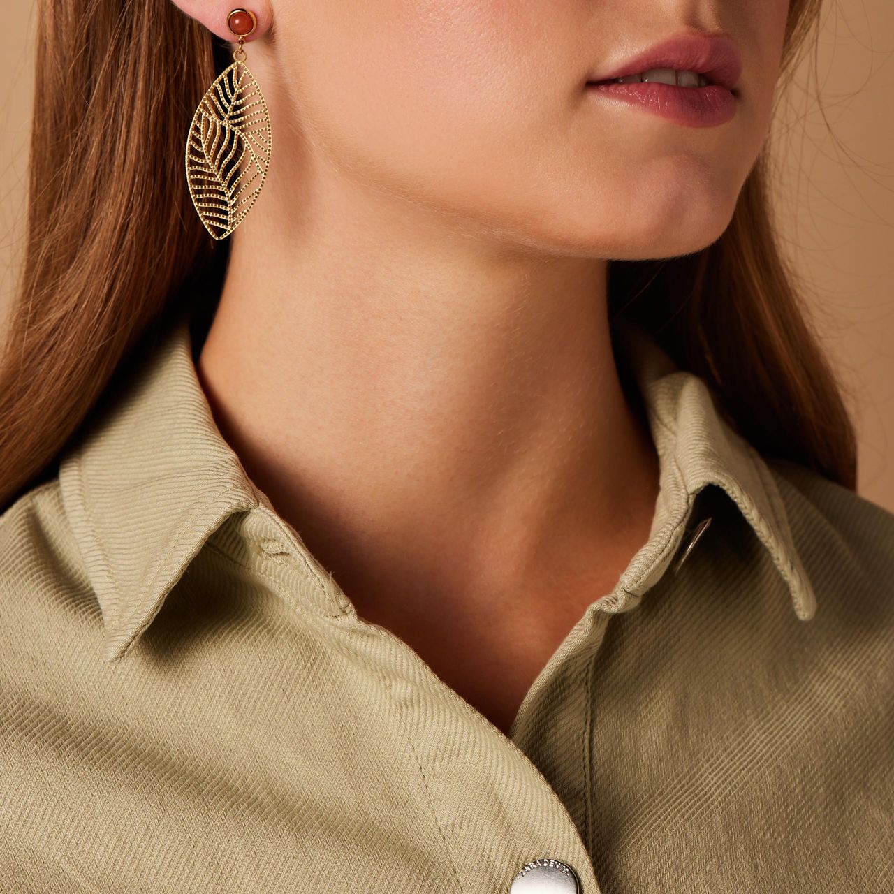 Stainless steel goldplated oorhangers blad voor dames