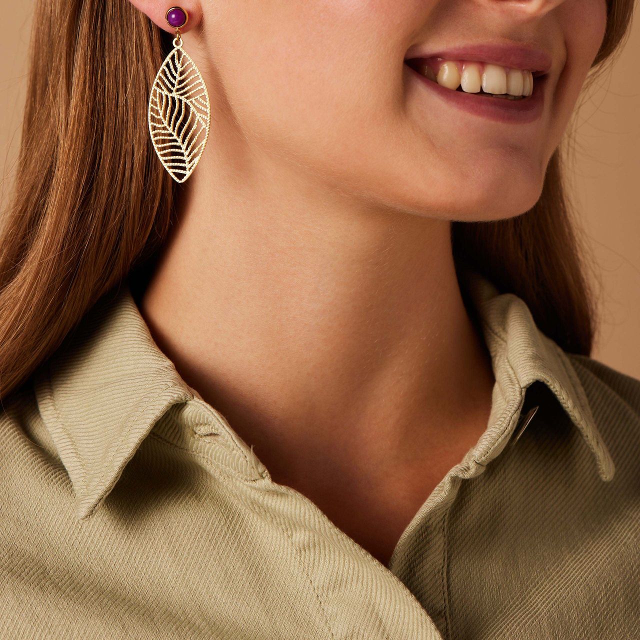 Stainless steel goldplated oorhangers blad voor dames