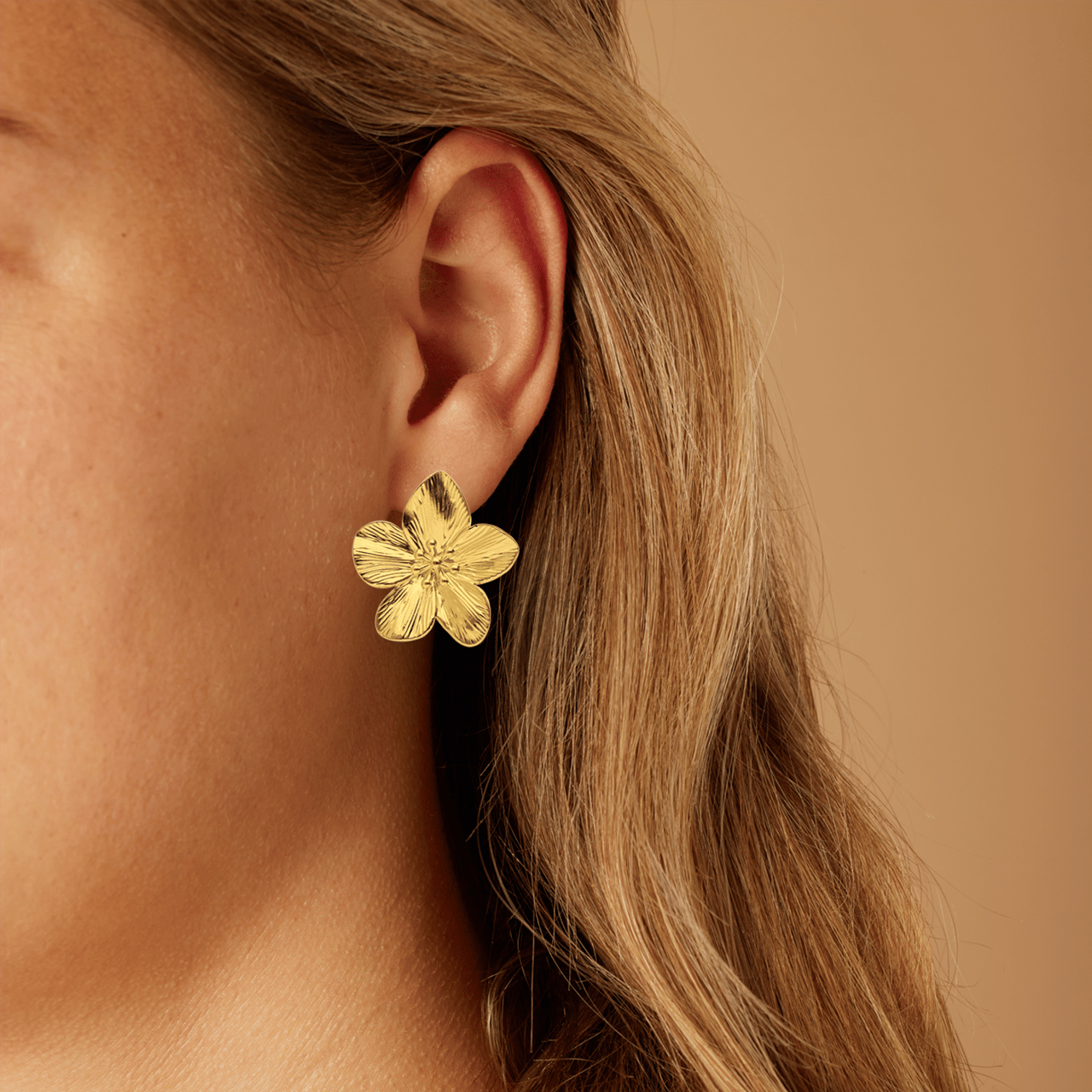 Stainless steel goldplated oorkappen bloemen voor dames