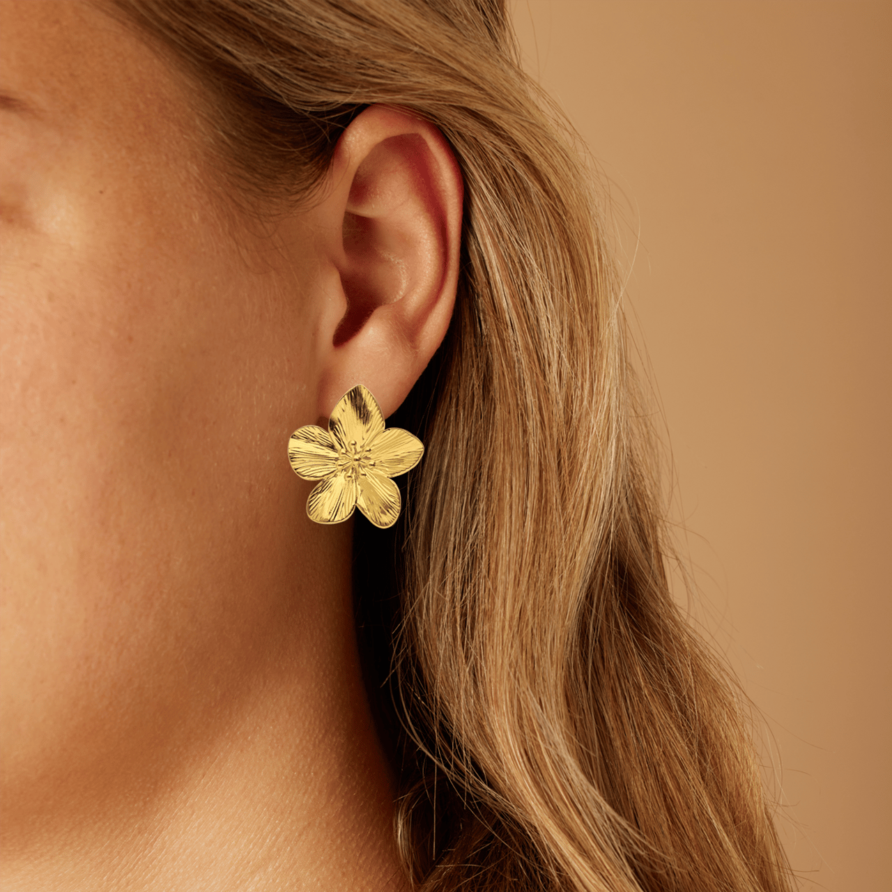 Stalen goldplated oorkappen bloemen voor dames