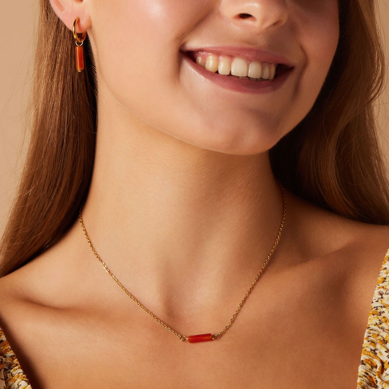 Stainless steel goldplated oorringen met rode onyx voor dames