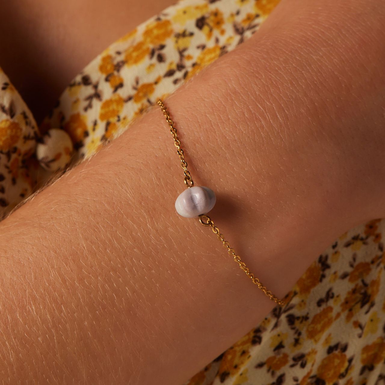 Stainless steel goldplated armband met pompoen
