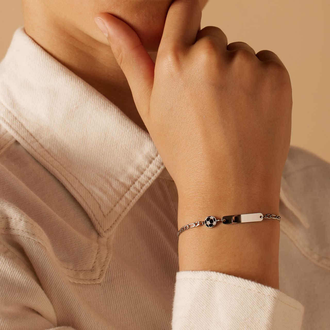 Plattenarmband aus Edelstahl mit Fußball