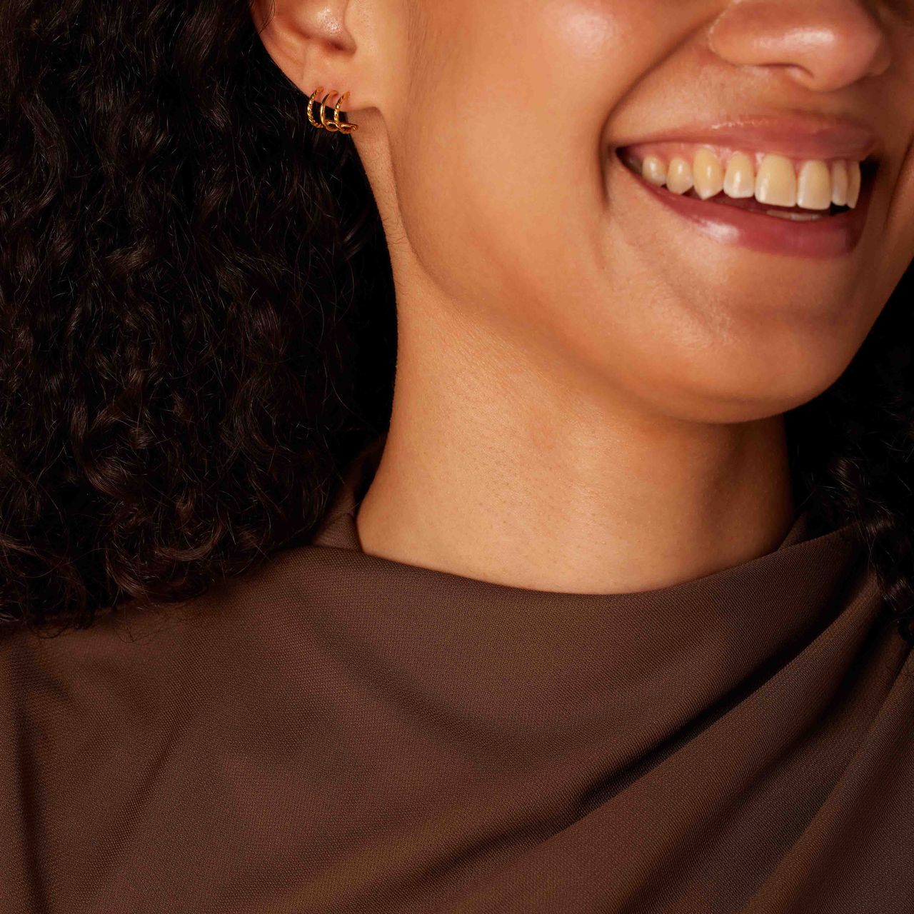 Stainless steel goldplated multi oorknop gedraaid en glad voor dames