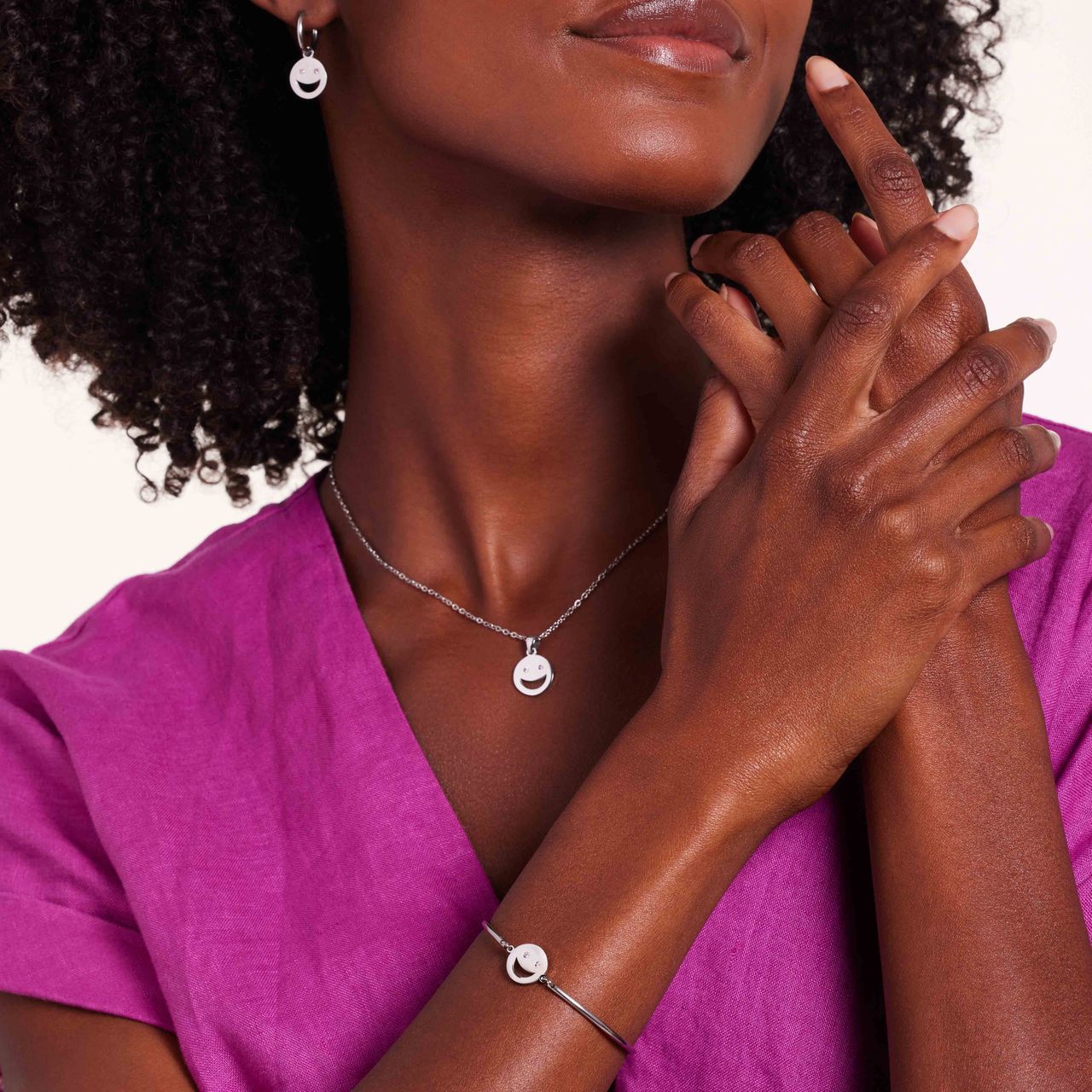 Stainless steel armband smiley met roze zirkonia