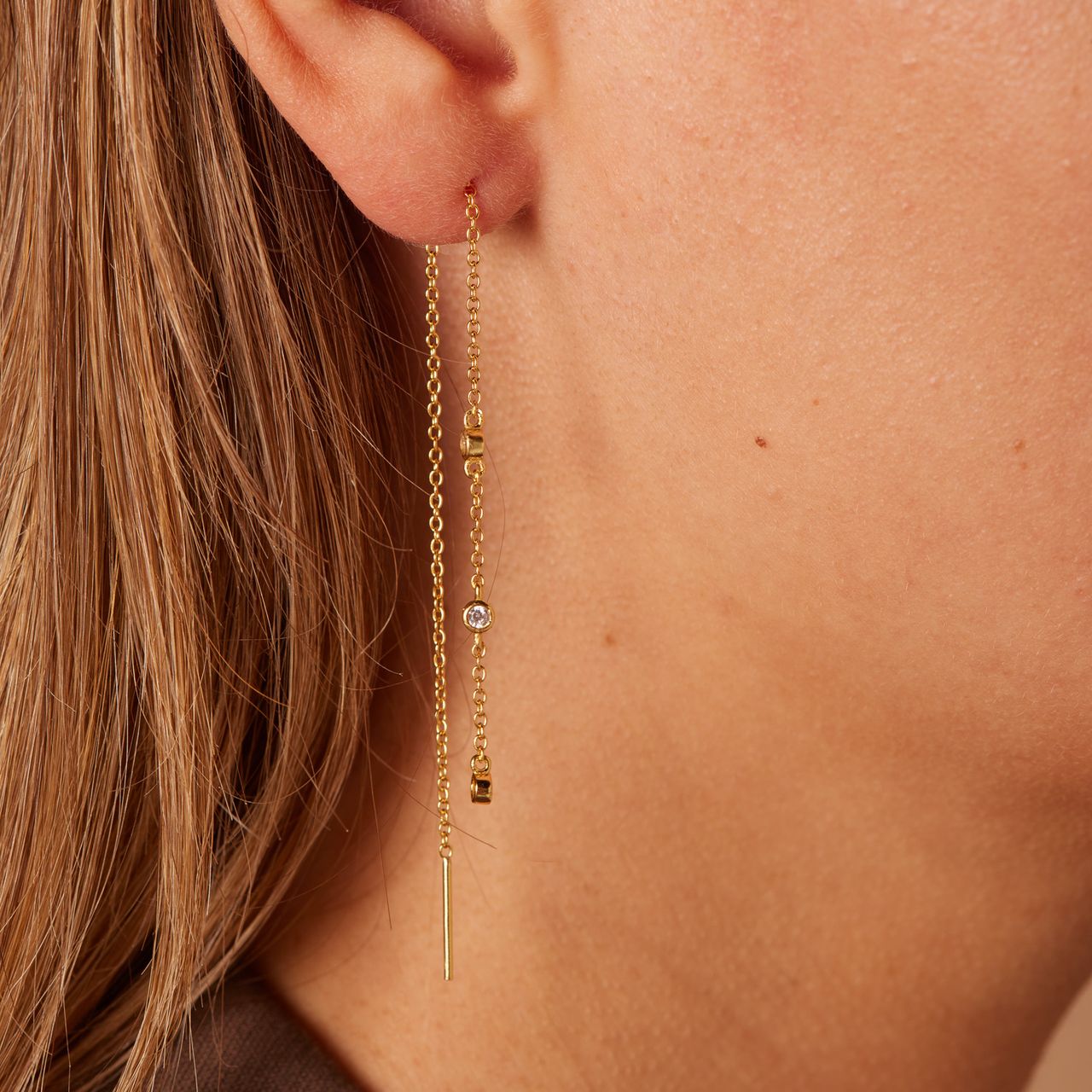 Zilveren goldplated doortrek oorbellen met zirkonia voor dames
