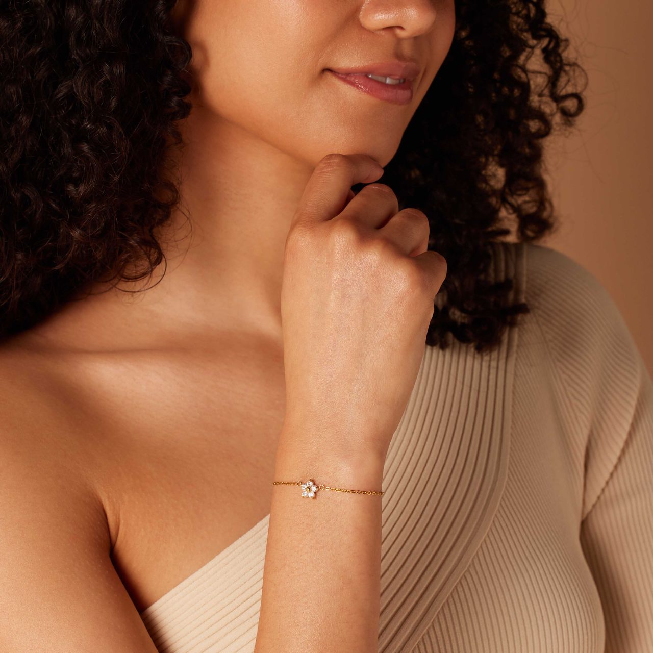 Stainless steel goldplated armband bloem met zirkonia wit