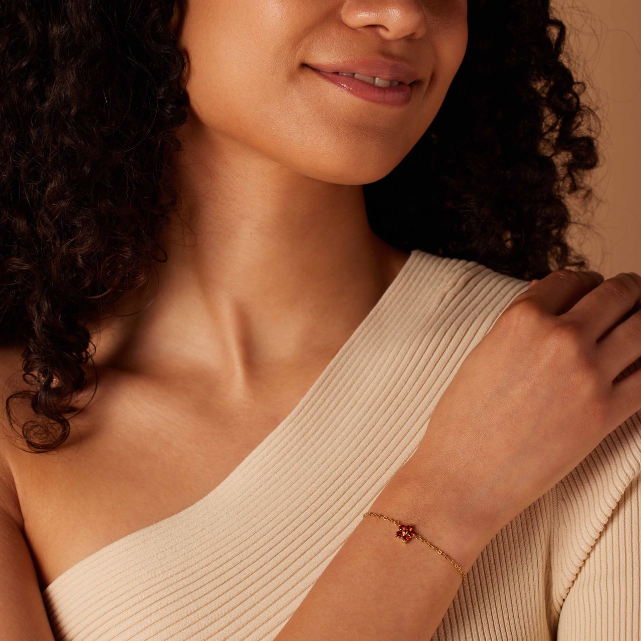 Stainless steel goldplated armband bloem met zirkonia rood