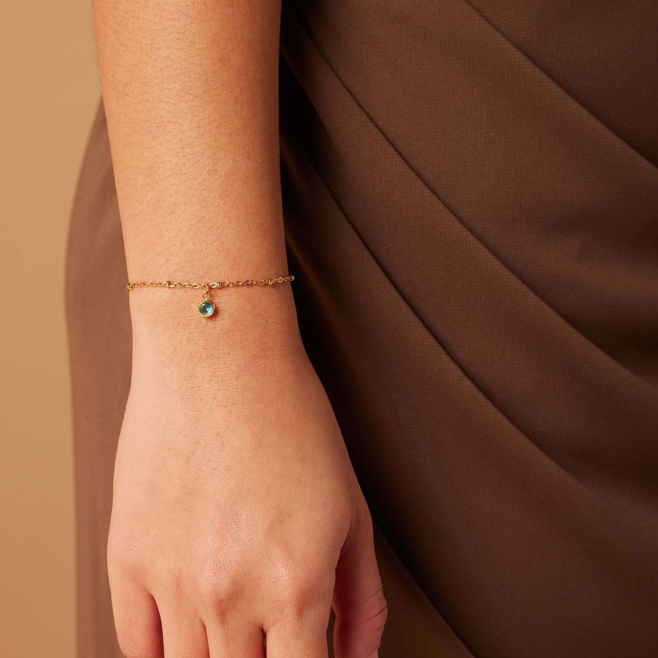 Stainless steel goldplated fantasiearmband met geboortesteen Maart voor dames