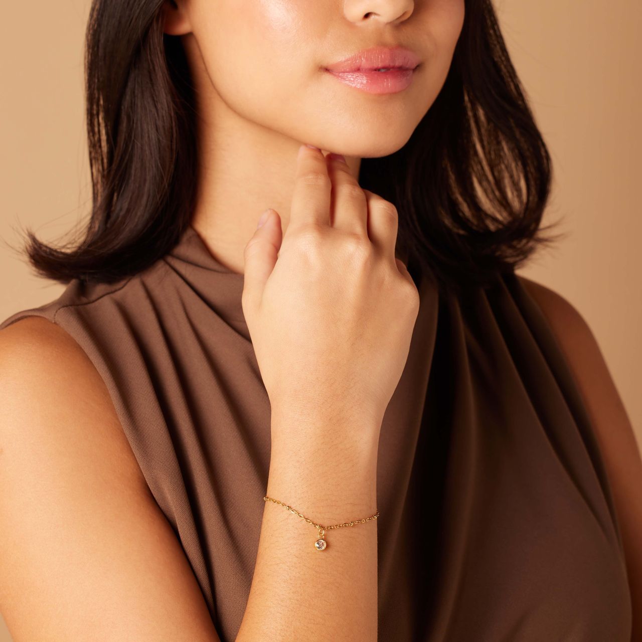 Stainless steel goldplated fantasiearmband met geboortesteen April voor dames